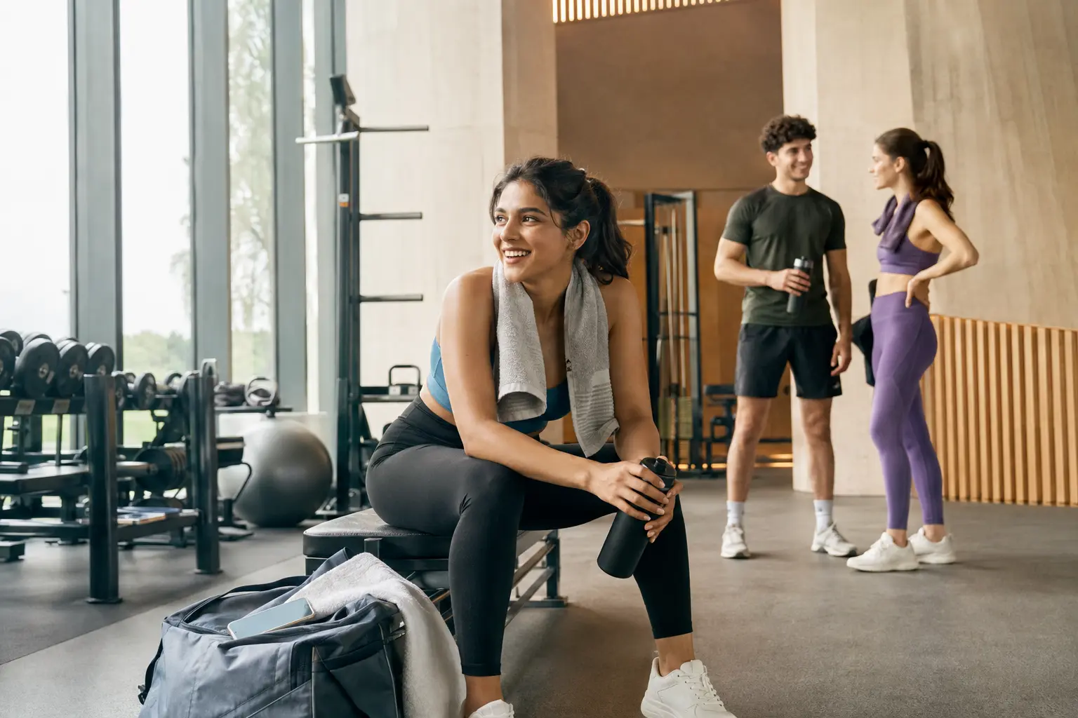 Young adult enjoying a confident gym workout while CoolPilot tracks simple goals